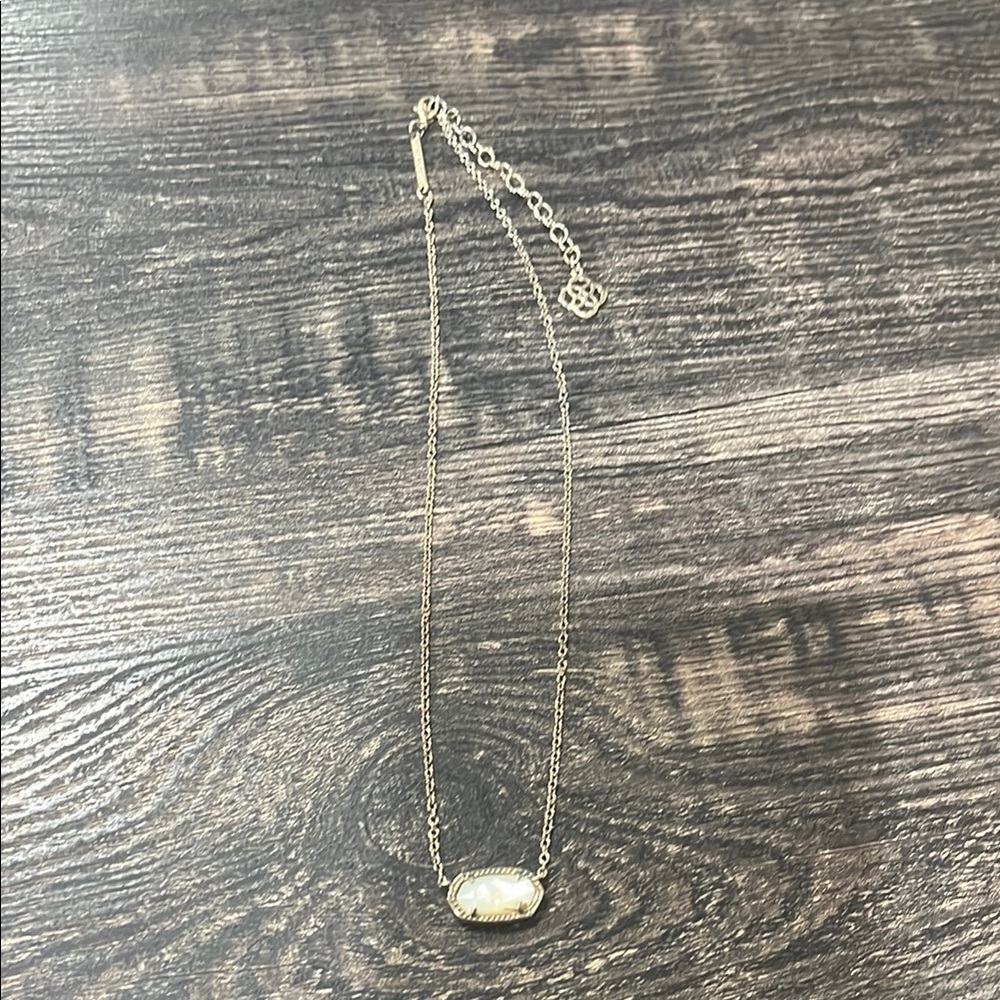 Kendra Scott Gold and White Necklace with Minimalist Design
